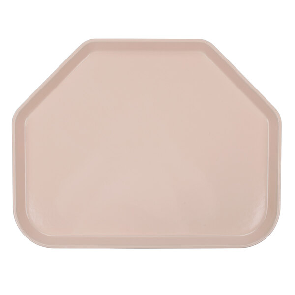 A light peach trapezoid shaped fiberglass tray with a white background and pink border.