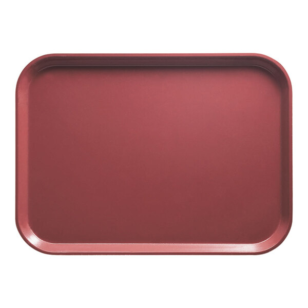A red rectangular Cambro tray with a white spot.