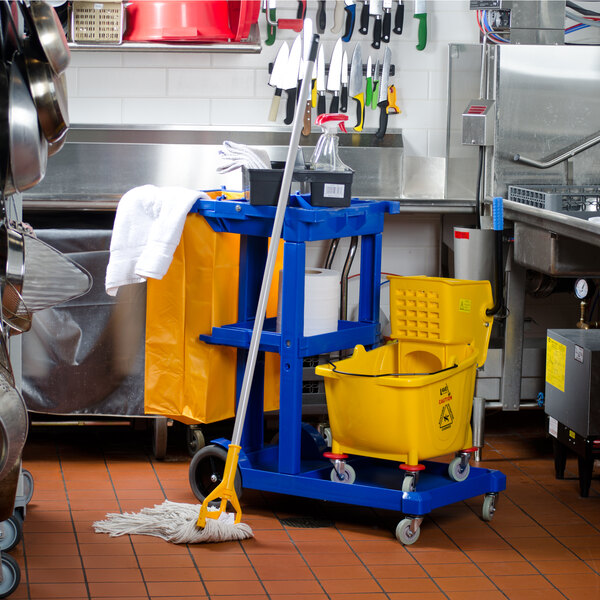 Lavex Janitorial Blue Cleaning / Janitor Cart Kit with Yellow Mop Bucket, Wet Floor Sign, Mop, and Caddy