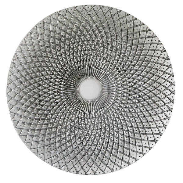 A close-up of a silver kaleidoscope glass charger plate with a pattern on it.