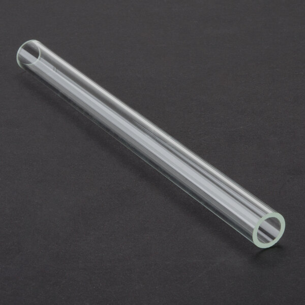 A close-up of a Bunn sight gauge glass tube on a black surface.