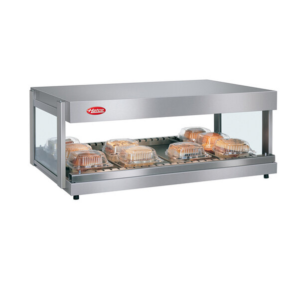 A Hatco countertop food warmer with a single shelf of food on display.