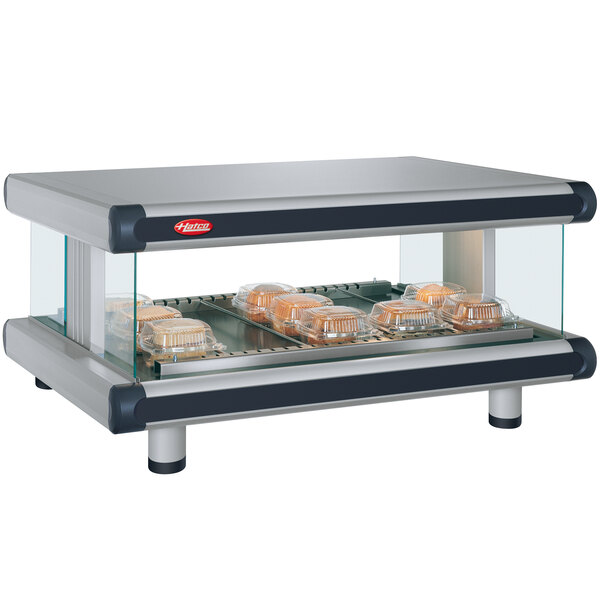 A Hatco countertop food warmer with a food tray on it.