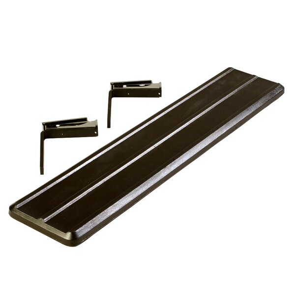 A black plastic Carlisle tray slide with metal clips on a counter.