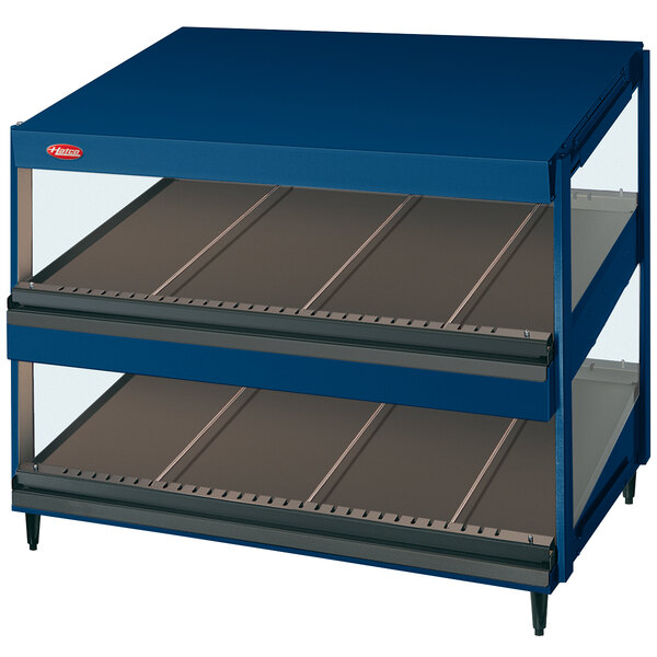 A navy blue Hatco display case with two glass shelves.