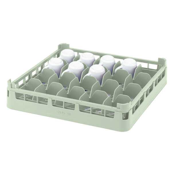 A light green Vollrath cup rack holding white cups.