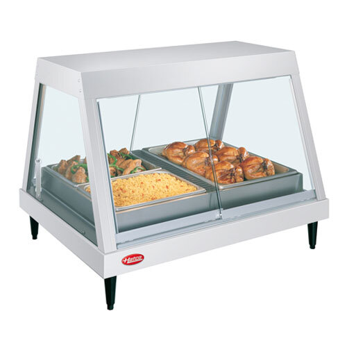 A Hatco countertop food warmer display with a tray of cooked chicken.