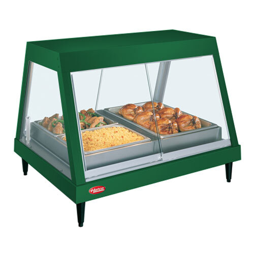 A Hatco Hunter Green stainless steel countertop food warmer with cooked chicken on a tray inside.