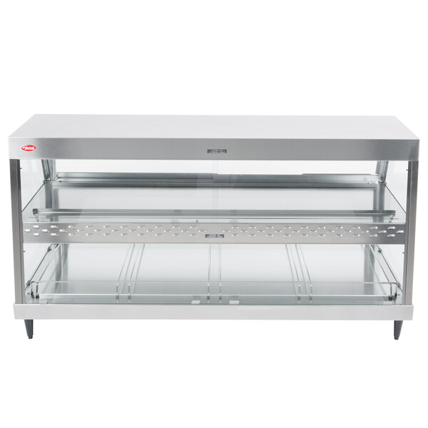 A stainless steel Hatco countertop merchandiser with dual glass shelves.
