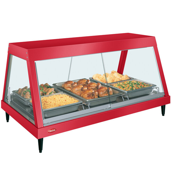 A red Hatco countertop hot food display warmer with a pan of vegetables in it.