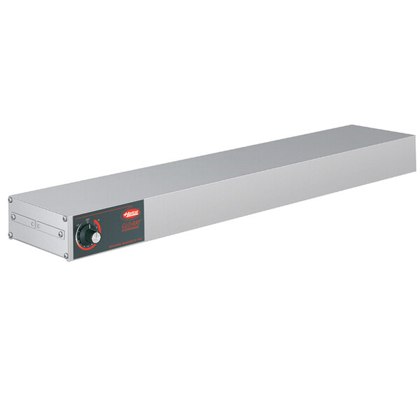 A long rectangular silver metal shelf with a red light and knob on it.