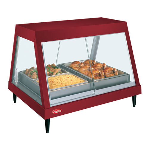 A red stainless steel Hatco food warmer with a shelf of food on display.