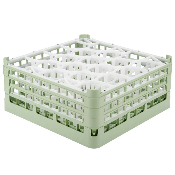 A Vollrath light green glass rack with 20 compartments.