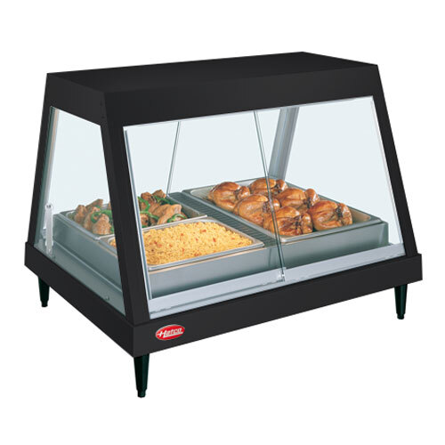 A Hatco countertop food warmer displaying cooked chicken on a tray.