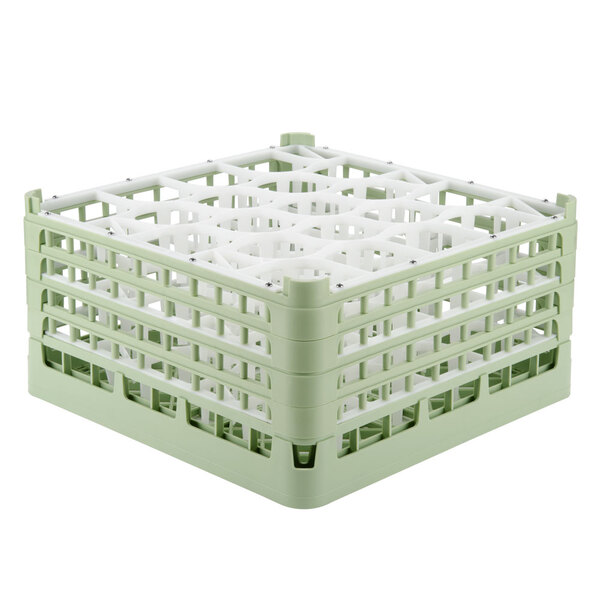 A light green Vollrath plastic glass rack with 20 compartments.