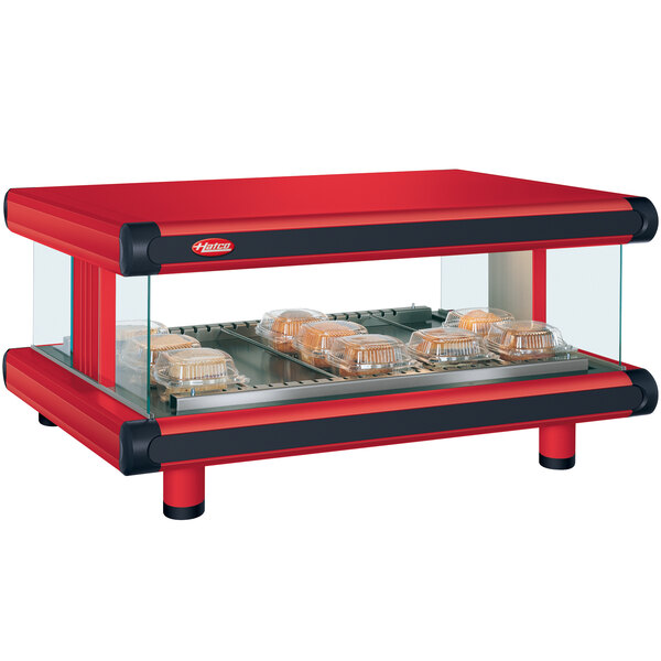 A red Hatco Glo-Ray warm food shelf in a countertop warmer.