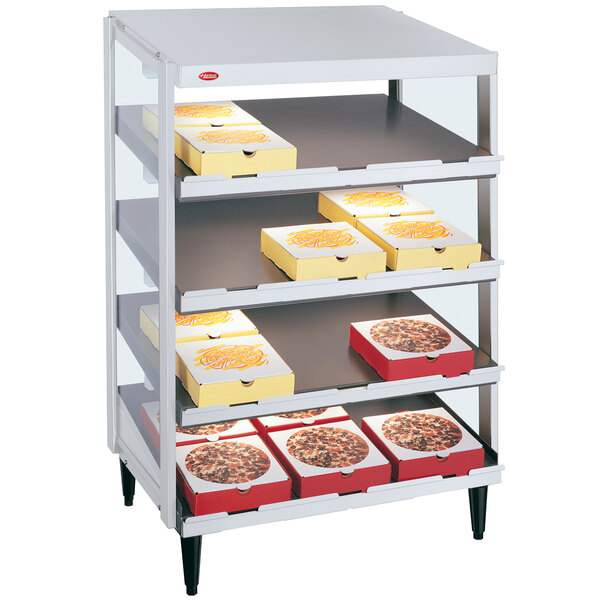A Hatco Granite White quadruple shelf pizza warmer holding trays of pizzas.