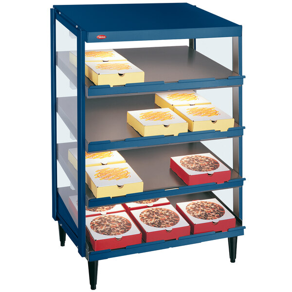 A blue Hatco countertop display case with shelves of pizza boxes.