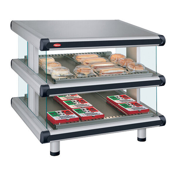 A Hatco Granite Glo-Ray double shelf food display case with food on it.