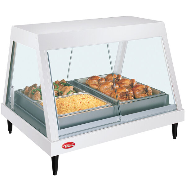 A white Hatco countertop food display case with a tray of food inside.