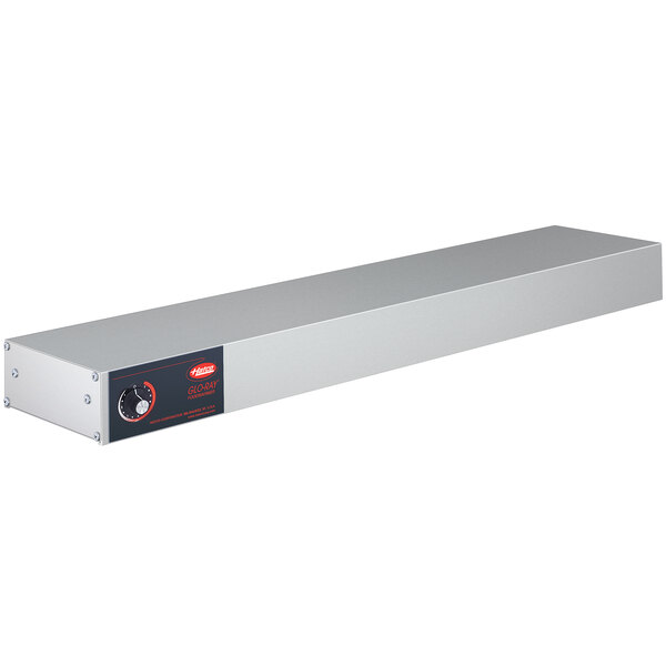 A long rectangular stainless steel metal object with a red button.