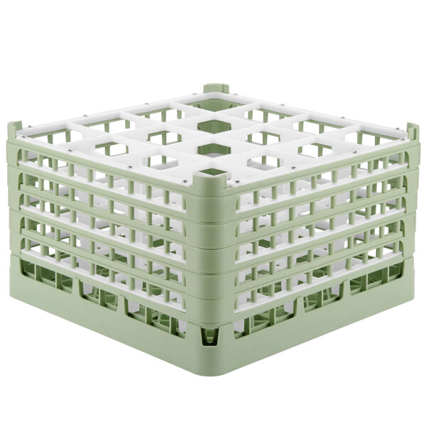 A light green plastic Vollrath glass rack with 16 compartments.