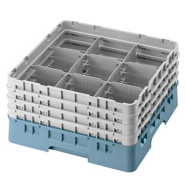 A teal plastic Cambro glass rack with 9 compartments.