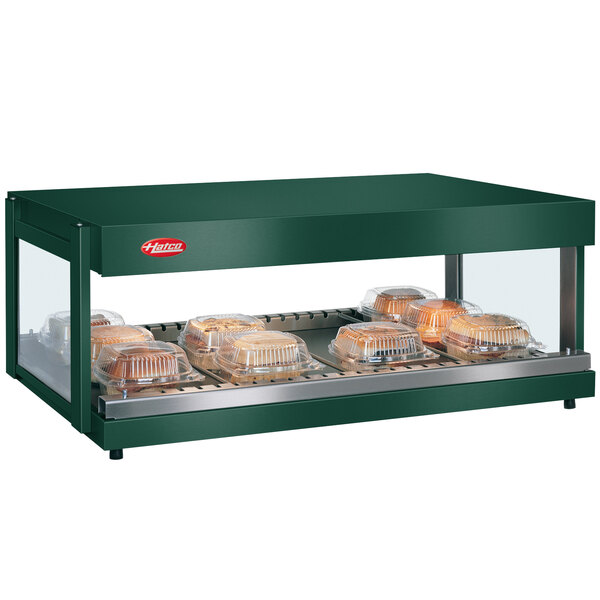 A Hatco Hunter Green countertop food warmer with clear plastic containers of food.