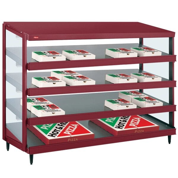 A red Hatco display case with pizza boxes on shelves.