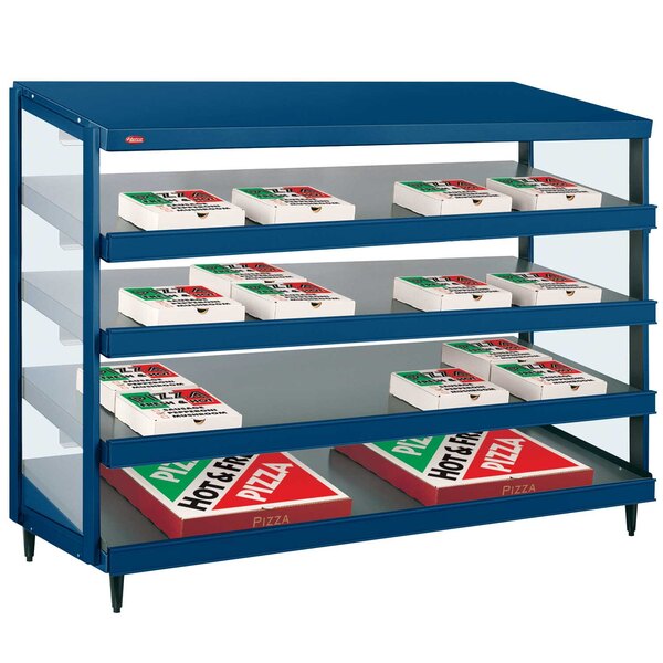 A blue Hatco countertop display case with pizza boxes on shelves.