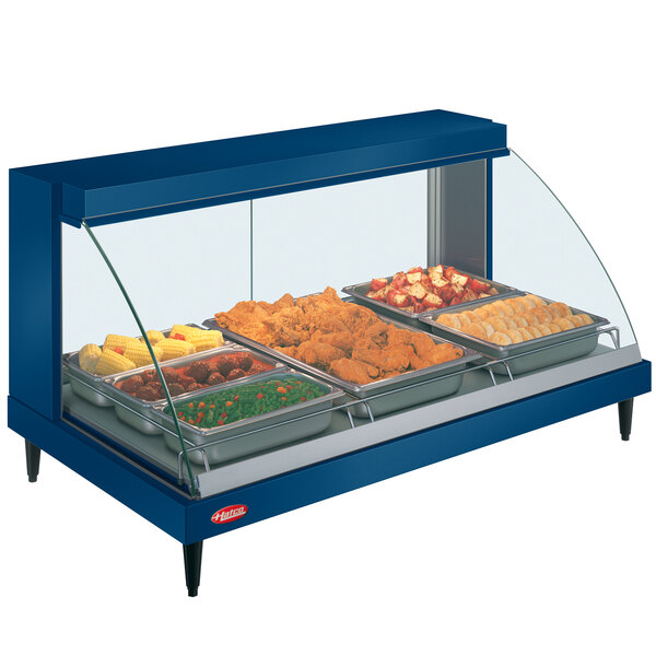 A blue Hatco Glo-Ray countertop food warmer display case with trays of food.
