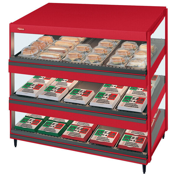 A red Hatco Warm Glo-Ray countertop food display case with food in it.