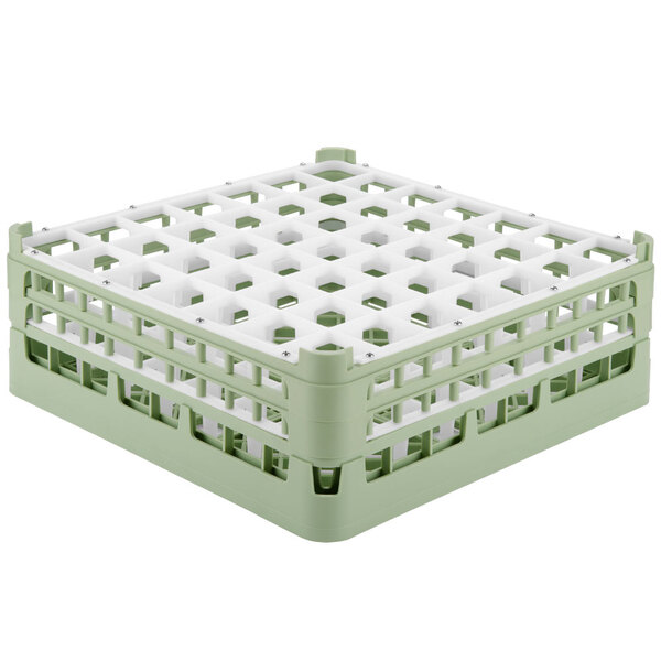 A white and green plastic Vollrath glass rack with compartments.