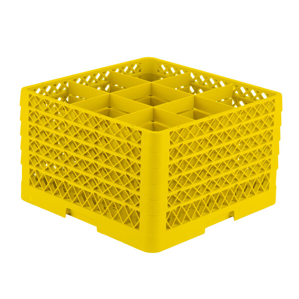 A yellow plastic Vollrath Traex glass rack with 9 compartments.