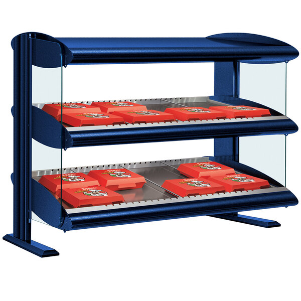 A blue Hatco horizontal double shelf merchandiser on a table in a bakery display.