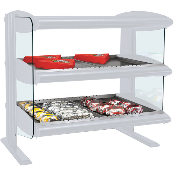 A white Hatco countertop food display with LED shelves holding food.