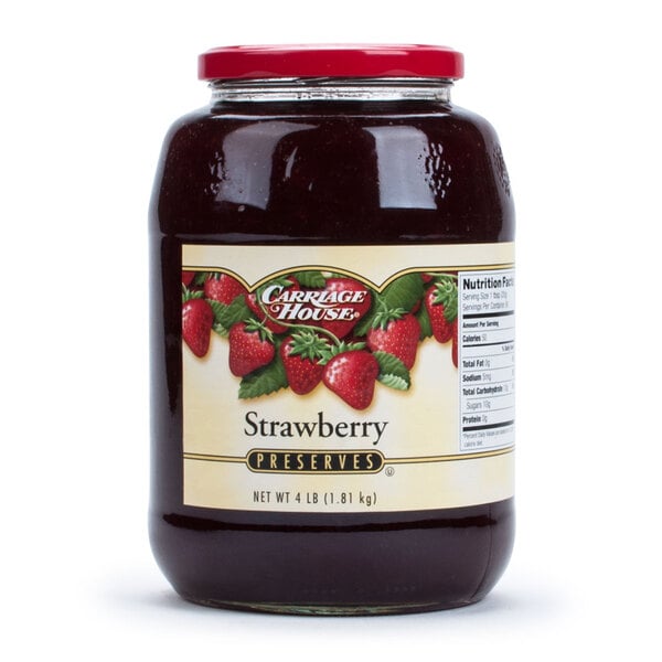 A case of 6 glass jars of strawberry preserves.
