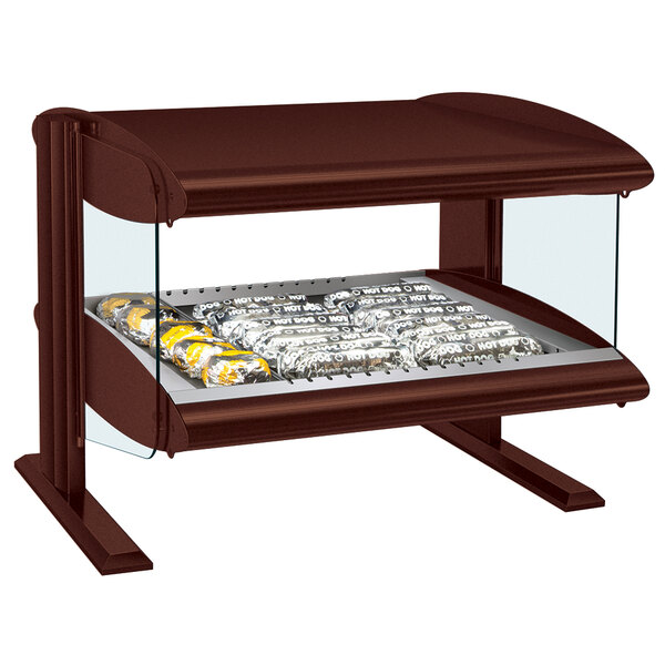 A Hatco countertop heated zone merchandiser with food on a tray in a glass case.