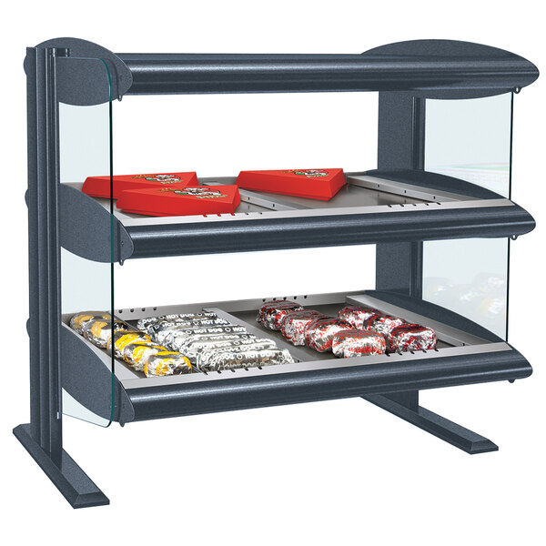A gray Hatco countertop heated zone display with food on shelves.