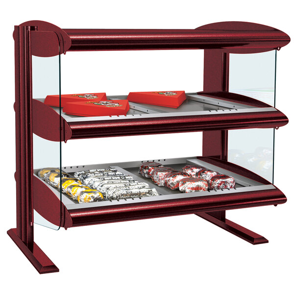 A red Hatco countertop heated zone display case with food on it.