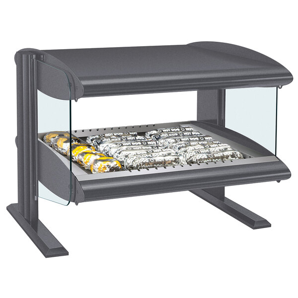 A Hatco countertop heated zone merchandiser with food on a single shelf.