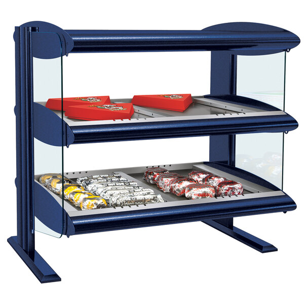 A navy blue Hatco countertop heated display case with shelves of food on display.