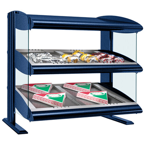 A Hatco navy blue slanted double shelf heated zone merchandiser with food displayed inside.