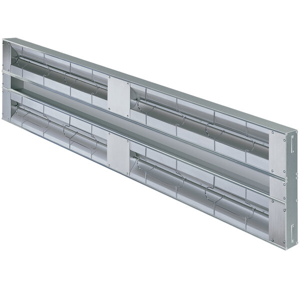A long metal shelf with metal bars and aluminum Hatco strip warmers on it.
