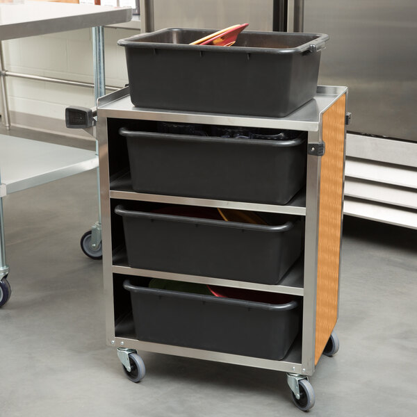 A stainless steel Lakeside utility cart with black shelves.
