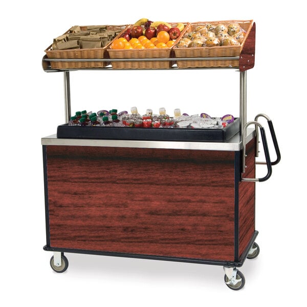 A Lakeside vending cart with fruit and vegetables on it.