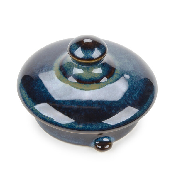 A blue ceramic Tuxton TuxTrendz tea pot lid.