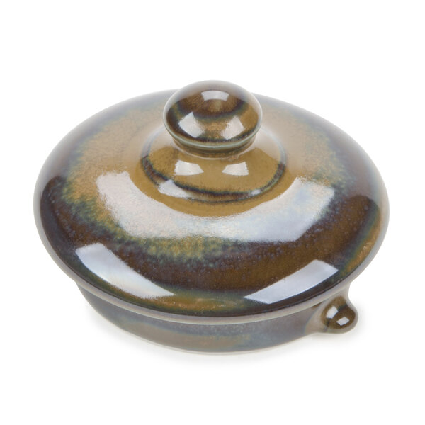 A brown ceramic TuxTrendz Artisan Mojave tea pot lid.
