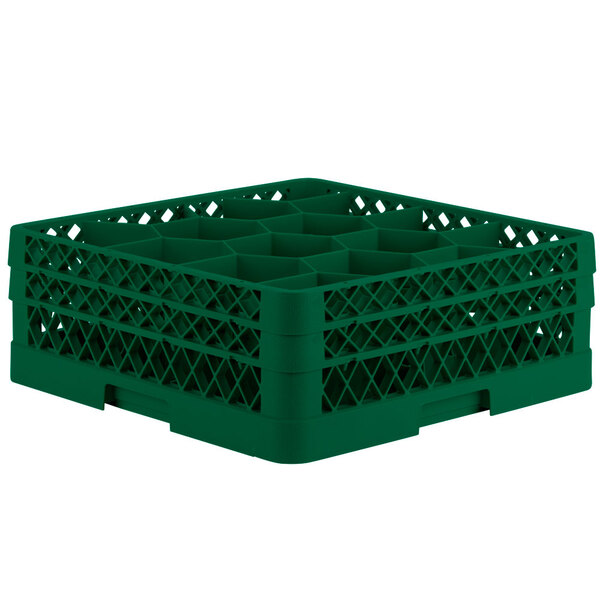 A green Vollrath Traex glass rack with 12 compartments.