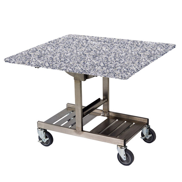 A Geneva room service table with a marbled top on a metal cart.